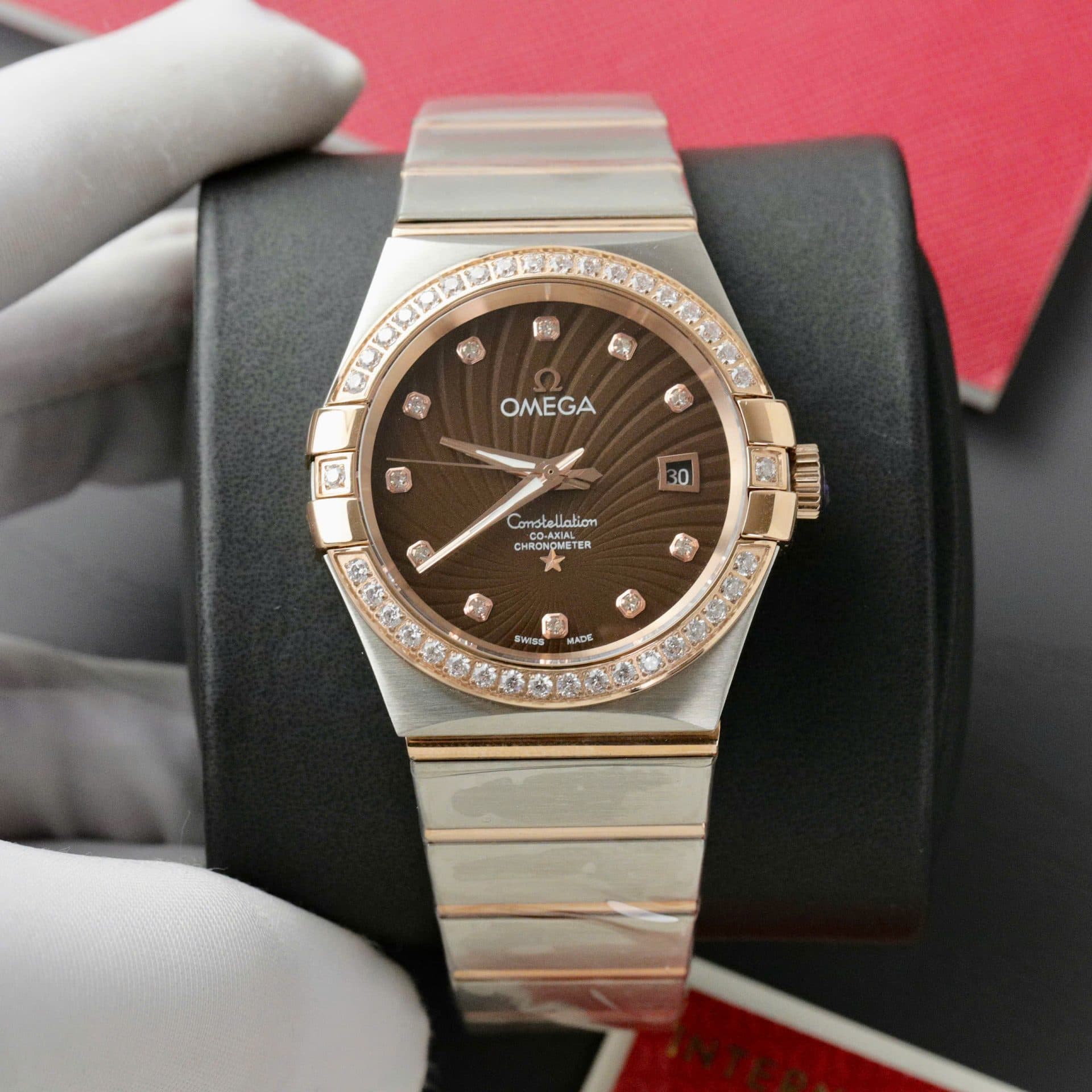 Dong-Ho-Omega-Constellation-Co-Axial-Fake-11-Demi-Vang-Hong-Mat-Nau-38mm-2-1